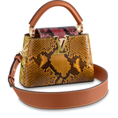 Shop the Louis Vuitton Capucines Mini at a discounted price - perfect for the fashion-forward woman!