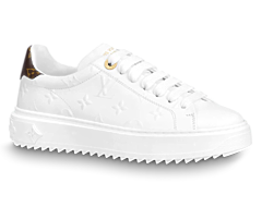 Shop the Louis Vuitton Time Out Sneaker for Women in White Debossed Calf Leather