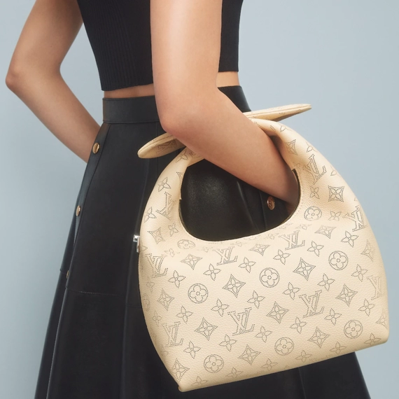 Get the Latest Women's Louis Vuitton Why Knot PM - Shop Now