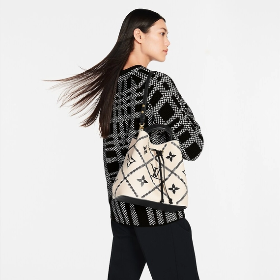 Get the NeoNoe MM Creme Beige/Black Handbag from Louis Vuitton