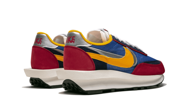 Stay stylish with the Sacai x Nike LDWaffle Trainer Varsity Blue/Varsity Red for Women's!