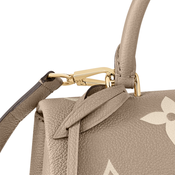 Buy the iconic Louis Vuitton Madeleine MM - the ultimate fashion statement for women