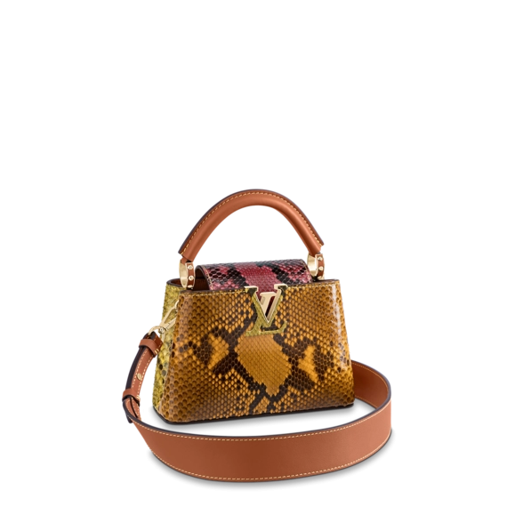 Shop the Louis Vuitton Capucines Mini at a discounted price - perfect for the fashion-forward woman!