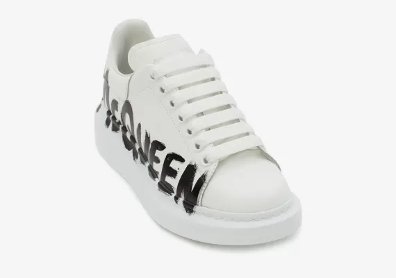 Shop Alexander McQueen Graffiti Oversized Sneaker in White/Black - Men's Discounted Sneakers