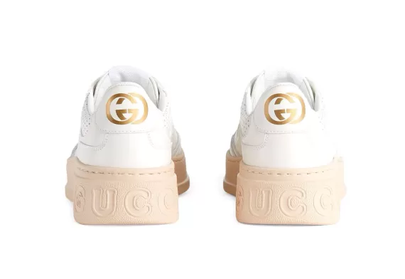 Upgrade Your Look - Women's Gucci GG Embossed Low-Top Sneakers in White/Peach