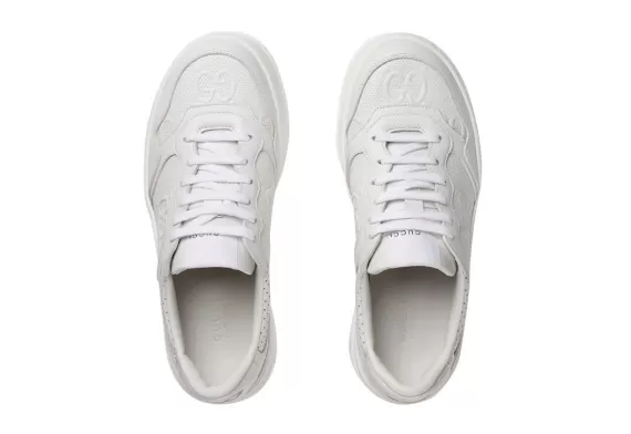 Women's Gucci GG Embossed Low-Top Sneakers. GG Supreme Print in White. Buy Now and Save.