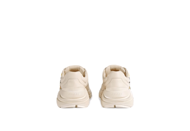 Men's Gucci Ivory Rhyton Logo Leather Sneaker at a Discount!