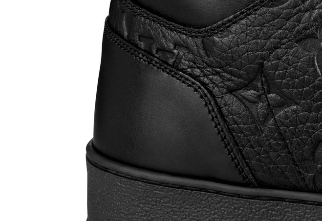 Shop Louis Vuitton Rivoli Sneaker Boot Monogram Embossed Grained Calf Leather Black for Men's Now