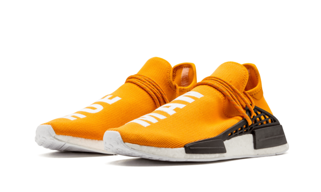 Make a fashion statement with the Pharrell Williams NMD Human Race - Tangerine/Orange!