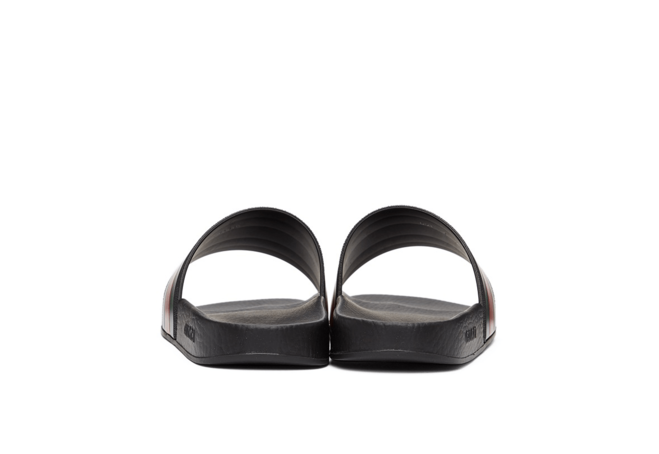 Shop Women's Gucci Black Pursuit Slides Now at a Discount!