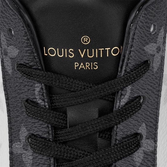 Look sharp with the Louis Vuitton Rivoli Sneaker - Ebene, Monogram canvas for men.